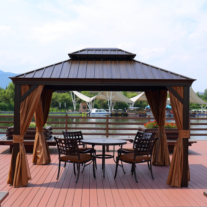 Varikatus SUNSET 3,65×4,85xH2/2,7m, pruun/beež Varikatused ja aiatelgid Varikatused ja aiatelgid